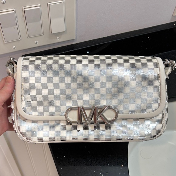 Michael Kors Handbags - NWOT Michael Kors Sequin Silver and White Bag